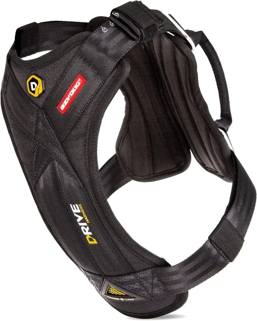 Black EzyDog Drive crash-tested dog car harness with padded chest plate and vehicle seatbelt loops.